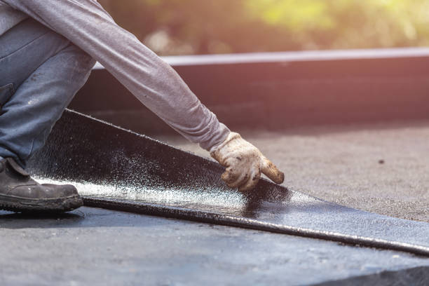 Professional Waterproofing technician working in Milton, NY